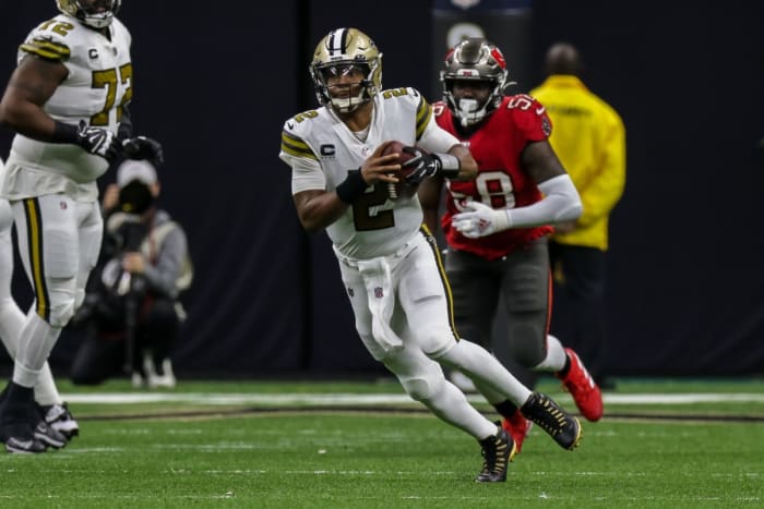 Oct 31, 2021; New Orleans Saints quarterback Jameis Winston (2) scrambles past Tampa Bay Buccaneers linebacker Shaquil Barrett (58). Mandatory Credit: Stephen Lew-USA TODAY Sports